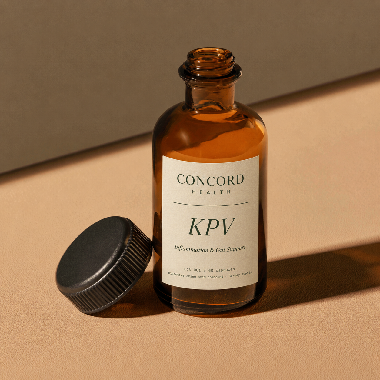 Concord Health KPV — the amber bottle, cap removed, on a warm bone surface in soft side light.
